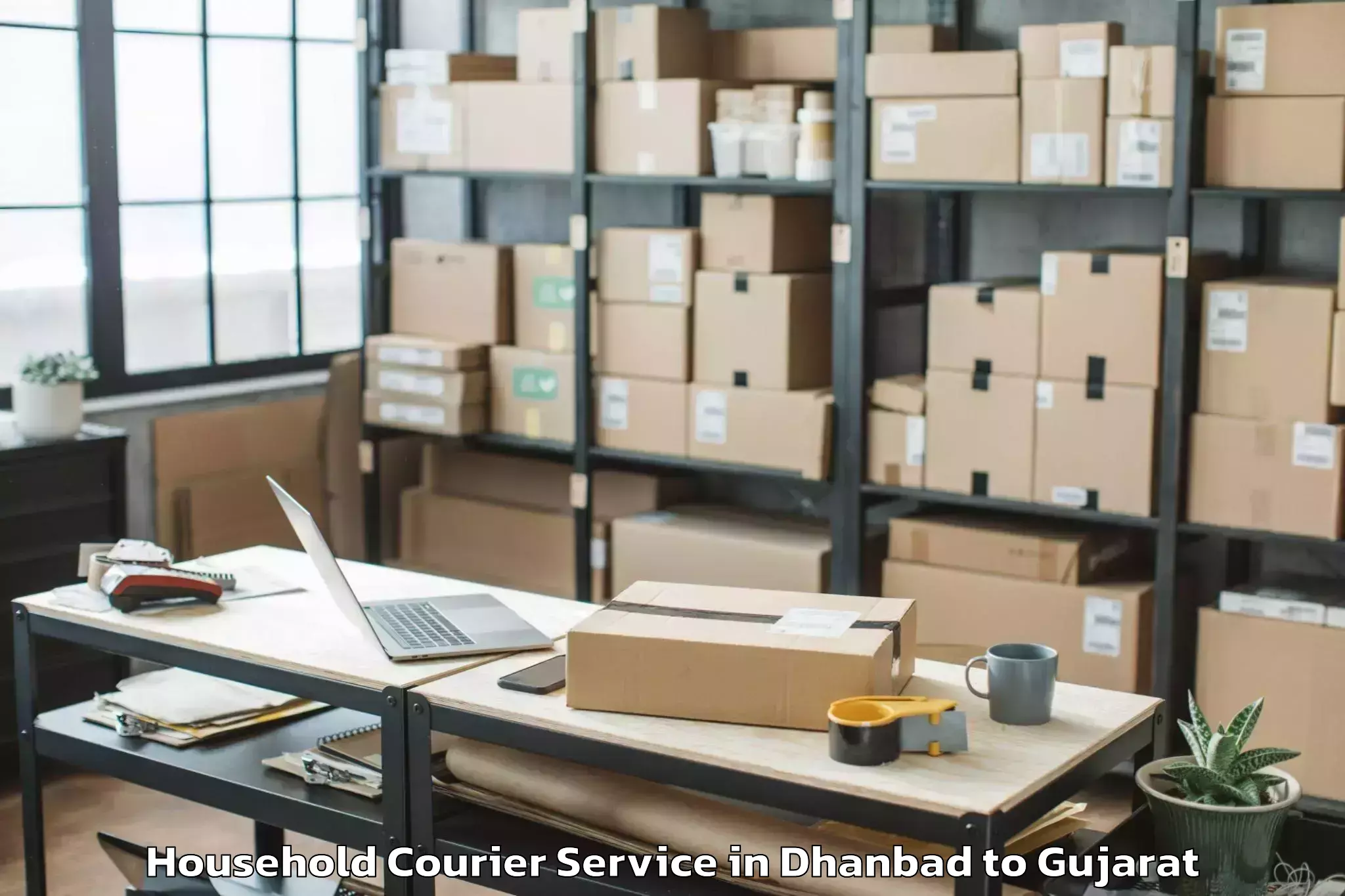 Reliable Dhanbad to Bharuch Household Courier